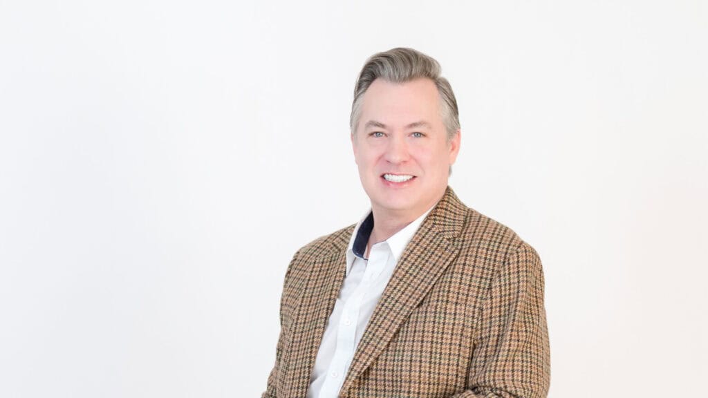 Portrait of Michael Hansen, Director of Advancement at Hand in Paw