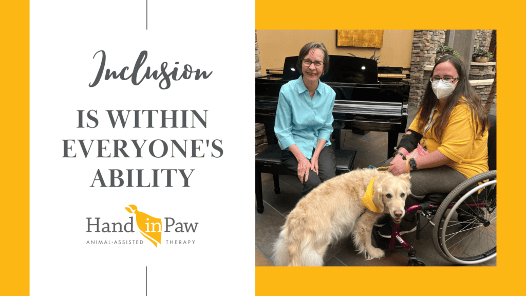 Hand in Paw therapy dog visiting a person in a wheelchair beside a message about inclusion and ability.